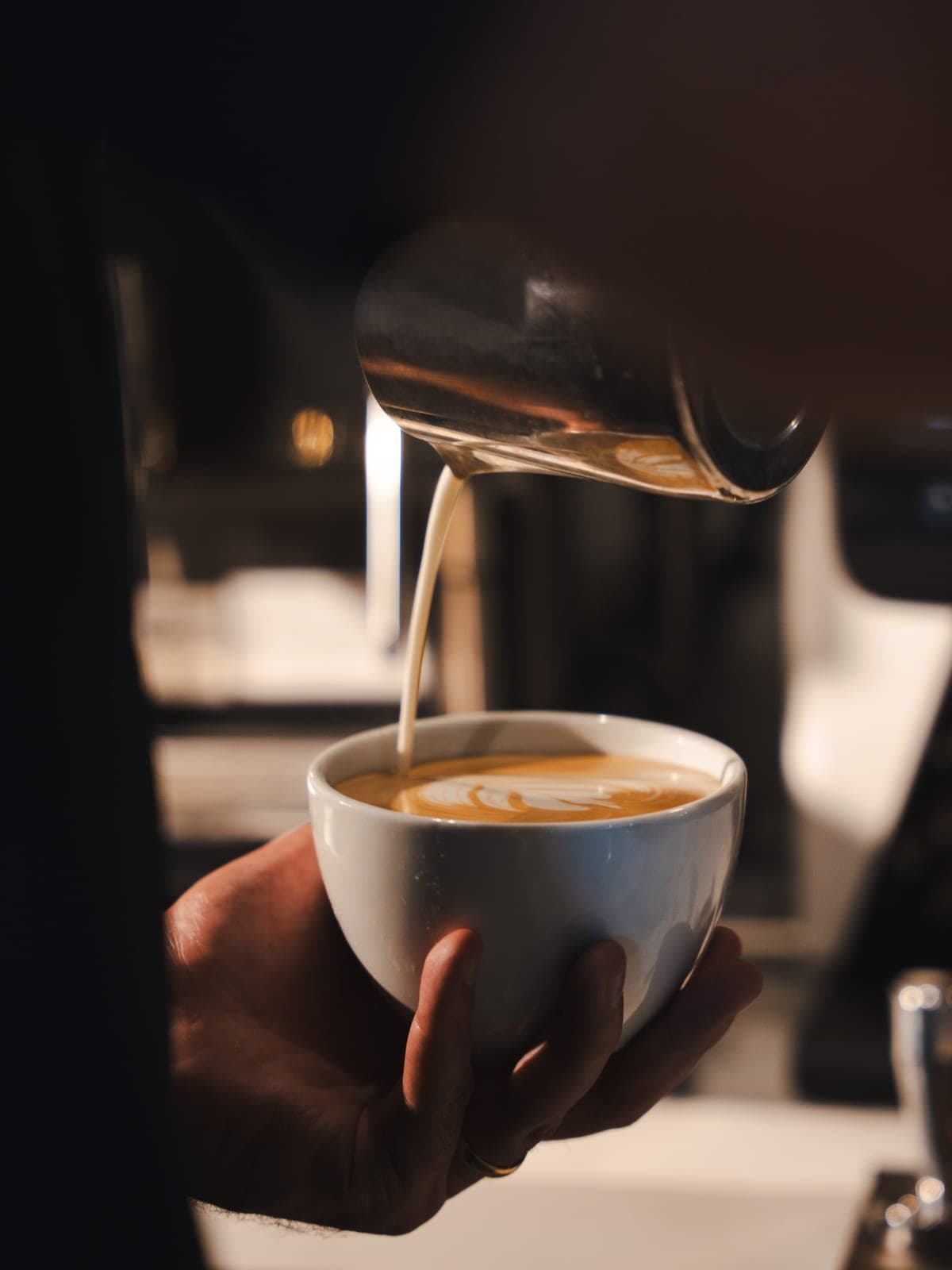 Latte art being poured